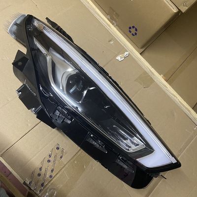 2019- Lámpara de cabeza de faro de plástico Luz corriente para MG ZS izquierda derecha blanco OE 10550754
