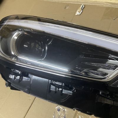 2019- Lámpara de cabeza de faro de plástico Luz corriente para MG ZS izquierda derecha blanco OE 10550754