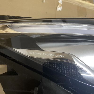 2019- Lámpara de cabeza de faro de plástico Luz corriente para MG ZS izquierda derecha blanco OE 10550754